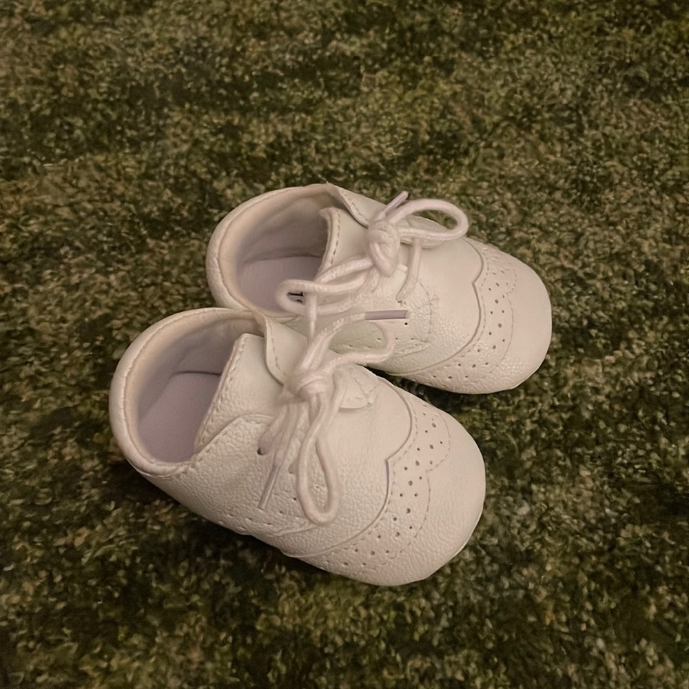 White baby crib shoes